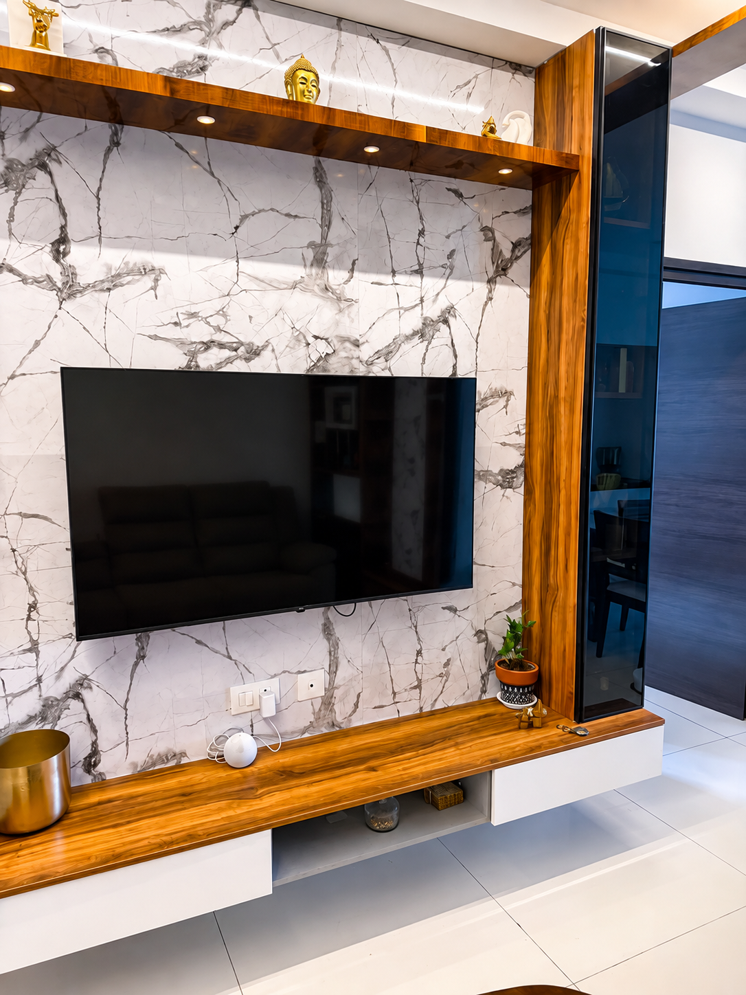 modern living room, luxury living room, stylish living room, contemporary interior, modern home interior, elegant room design, TV unit design, TV wall design, marble wall TV unit, wooden TV unit, modern entertainment unit, living room furniture, minimalist living room, premium home decor, sophisticated interior design, cozy living space, functional living room, space saving furniture, modern apartment interior, urban home design, working professionals room, room for working professionals, student room ideas, room for students, study friendly room, work from home room, productive workspace, comfortable study space, modern study room, multipurpose room design, smart home interior, aesthetic room design, luxury home decor, wooden wall design, marble interior design, designer TV panel, floating TV unit, storage TV unit, modern wall shelves, decorative wall shelves, indoor plant decor, ambient lighting, LED lighting interior, stylish home furniture, contemporary home decor, residential interior design, elegant home setup, premium living space, modern room inspiration.